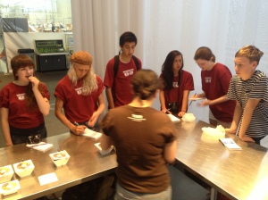 Students line up for a gourmet taste test at the TCHO chocolate factory in San Francisco. Photo by NBTB staff. 